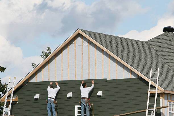 Professional Emergency Siding Repair technician working in Spring Valley, MN